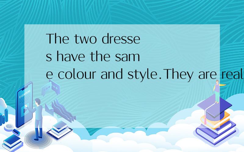 The two dresses have the same colour and style.They are real