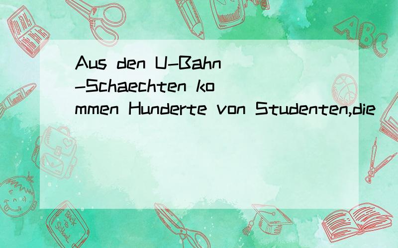 Aus den U-Bahn-Schaechten kommen Hunderte von Studenten,die